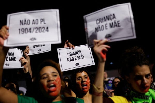 Women protest against a bill that would equate legal abortion carried out in Brazil after 22 weeks of pregnancy with the crime of murder, in Sao Paulo